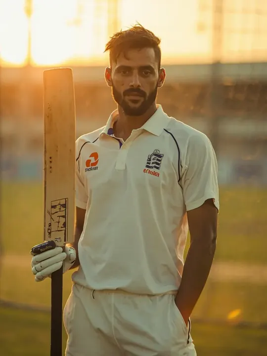 Top-order batsman portrait in team kit